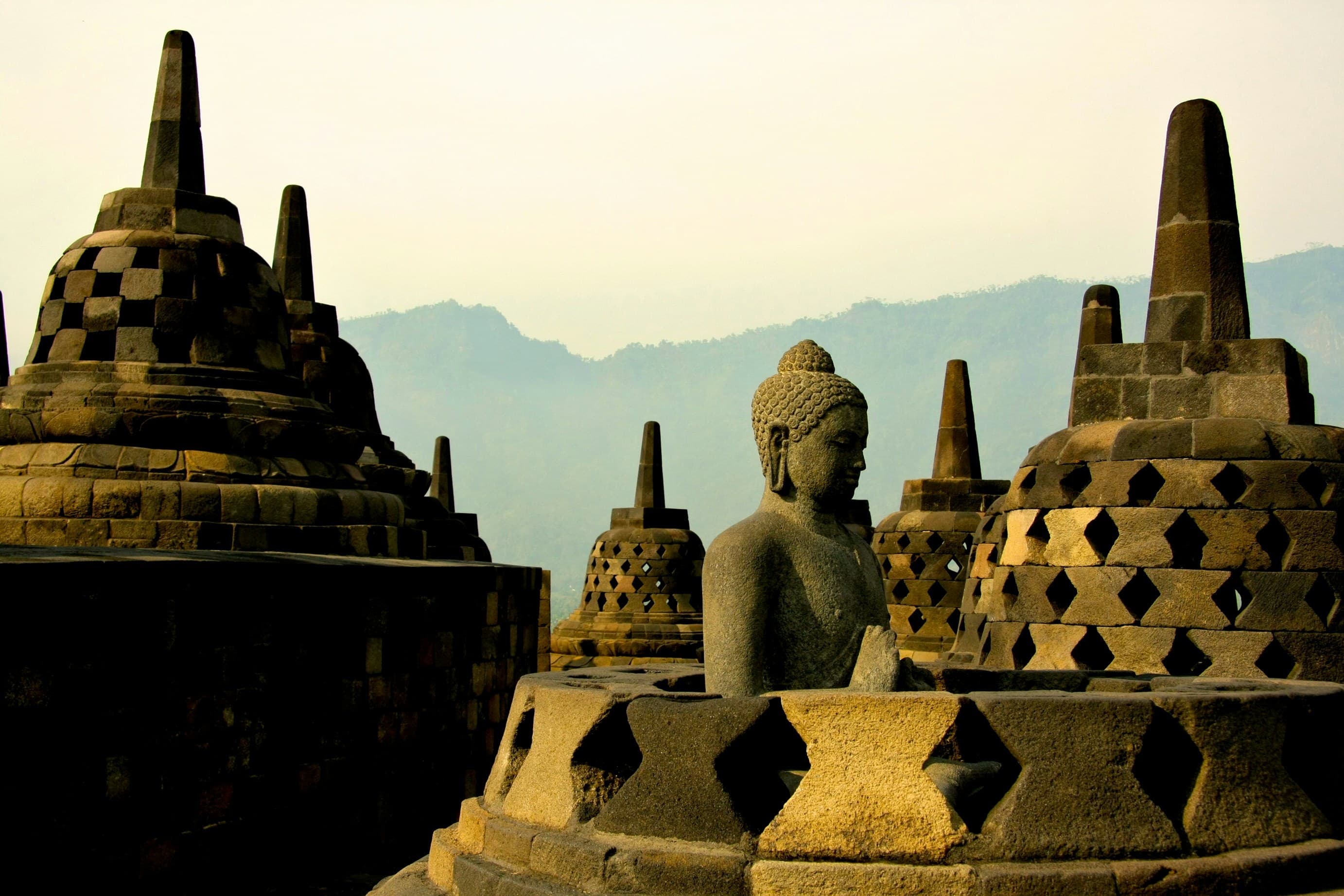 Borobudur temple stupas in morning mist - Parikesit heritage